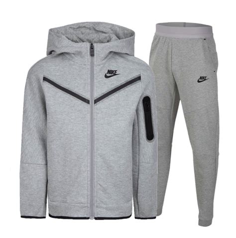 grijze nike tech pak|Nike tech pak.